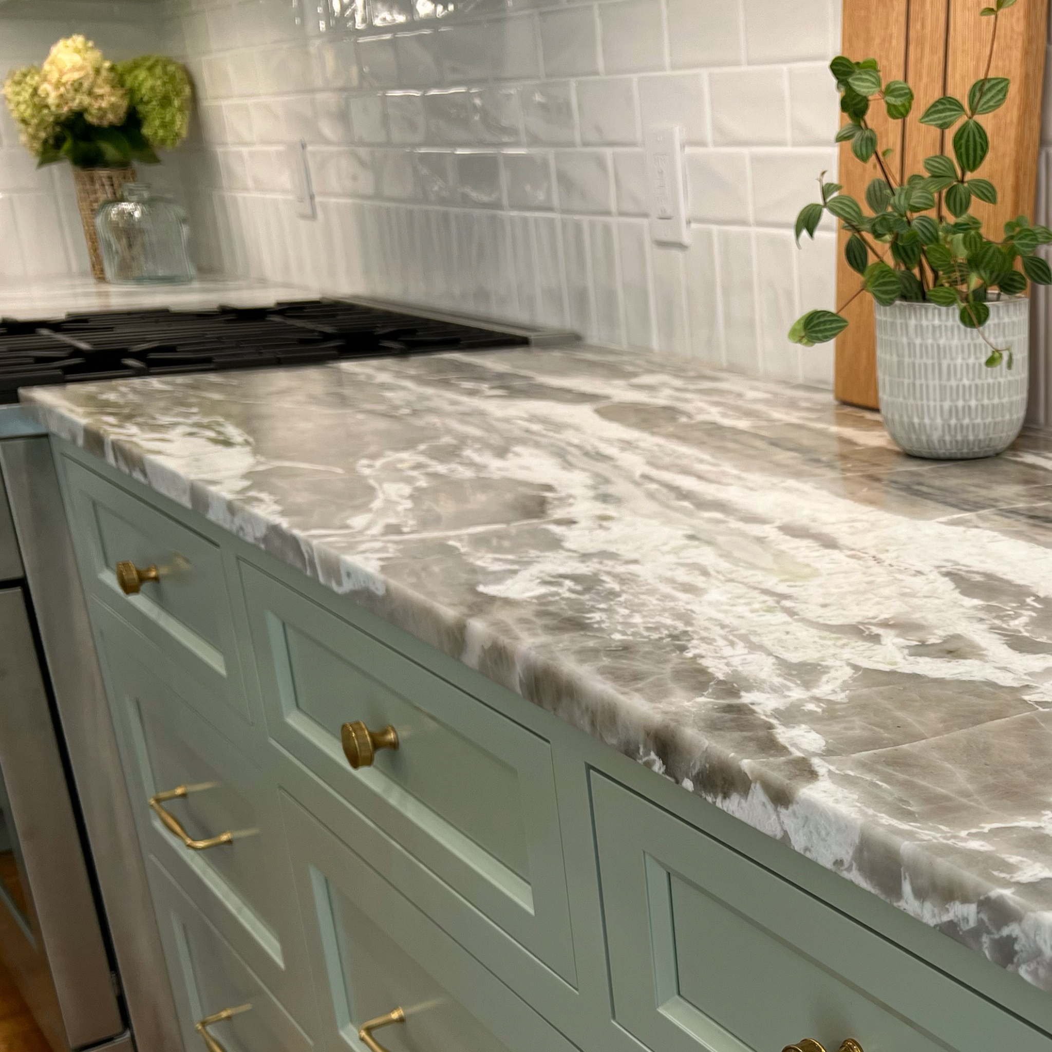 Detail of flush-inset cabinet doors fitted precisely within the cabinet openings